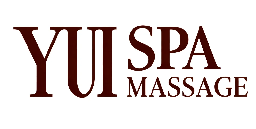 YUI Spa Massage wordmark — oxblood serif on white